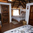 Tabonina Guesthouse - Inside Room 5, Thatched-roof chalet, 2 double beds, ensuite, TV, fridge